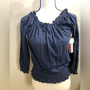 Navy blue long sleeve top.